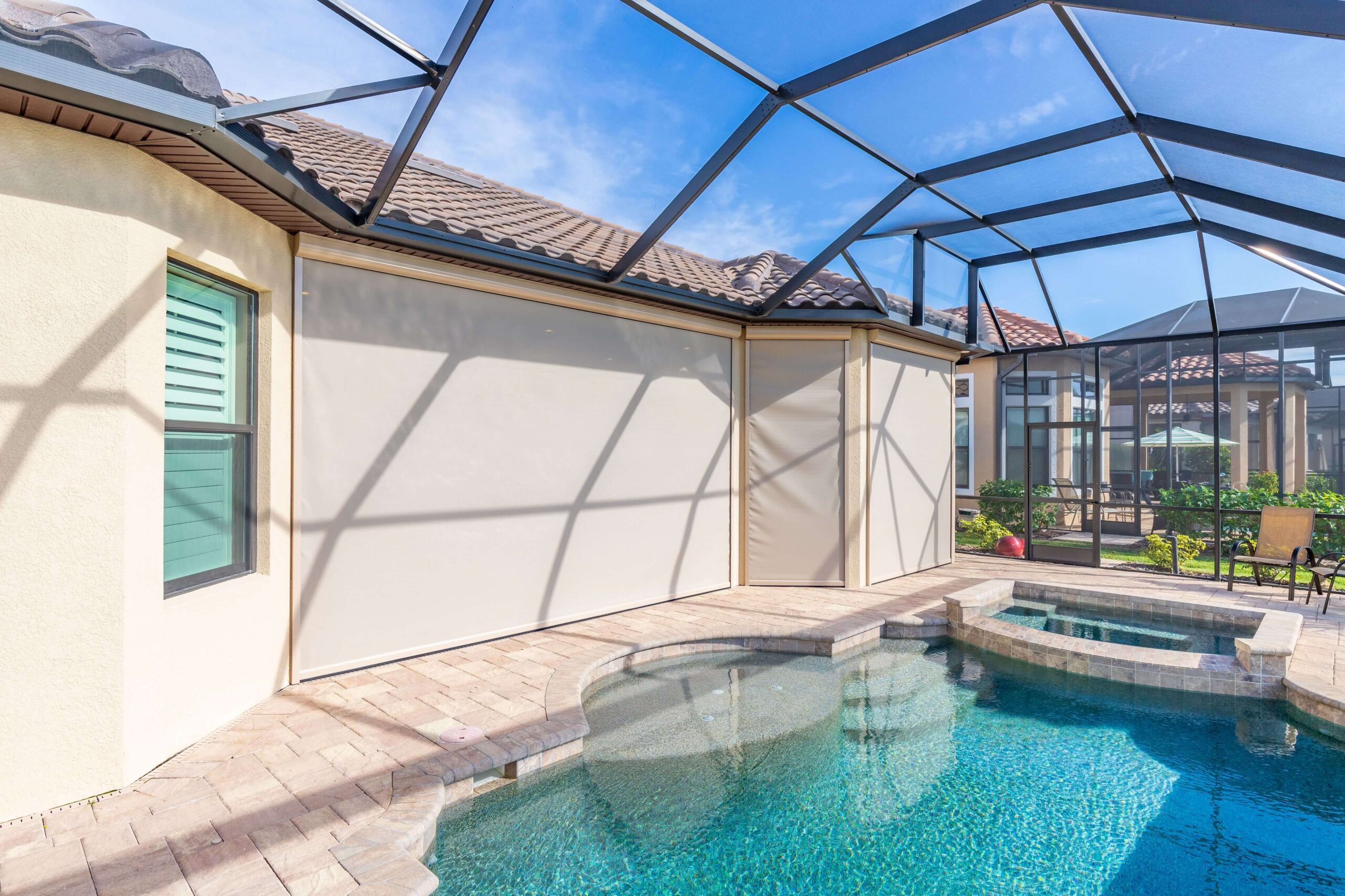 Transform Your Outdoor Living with Motorized Pool Screens - Sun Solutions